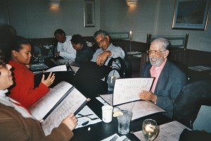 John Henry dining with sons and daughters